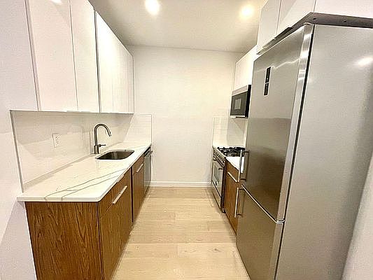 3rd image of 327 E 12th St APT 20