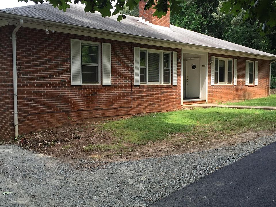Front of duplex. Available unit is closer to Stadium Road