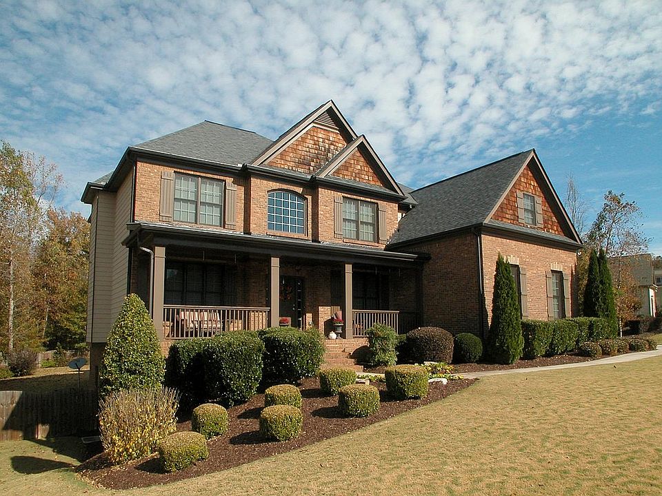 Welcome home to a custom masterpiece in sought after Burnt Hickory Subdivision