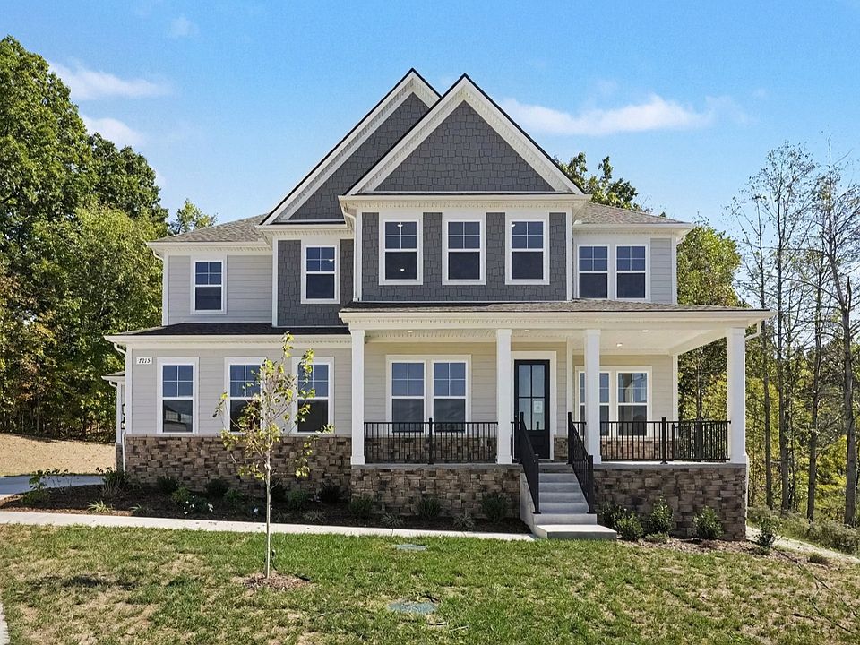 Front exterior of beautiful two-story home plan Solace II