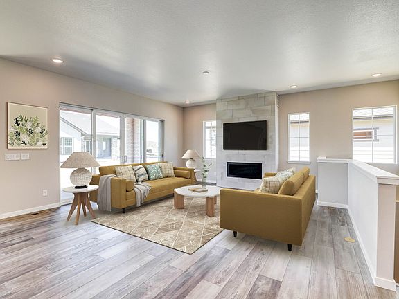 The gathering room in the Salerno is brightly lit with natural light throughout.