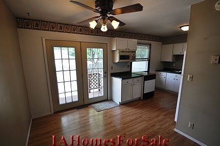 Dining Area with french doors leading to backyard.
