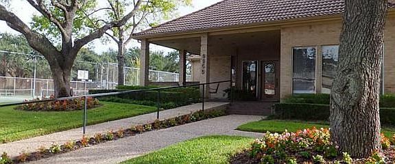 Recently installed new fence encloses your private patio and a/c access at rear of the garage.  Walkway from the alley to the street at the front separates you from your neighbor.
