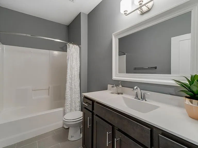 Our bathrooms include spacious vanities with storage, perfect for keeping your essentials organized.