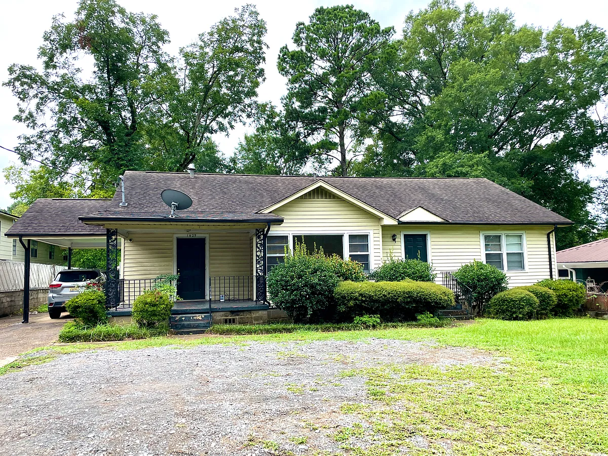 Covered Parking at the side of the house and extra parking in the front of the house. - 1425 Hargrove Rd E