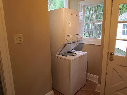 Stack laundry in mudroom off kitchen