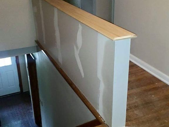 replaced iron rail with wall