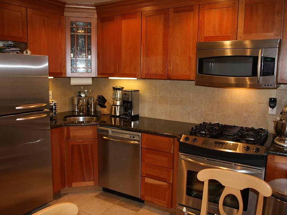 Custom kitchen. Hand-chipped Italian tile floor and backspl