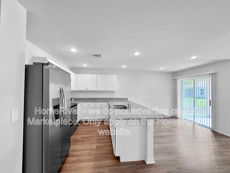 4748 NW 39th Pl — Photo 9