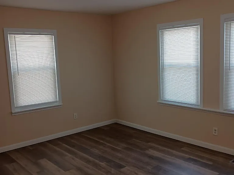 Living room with all new flooring, paint and trim