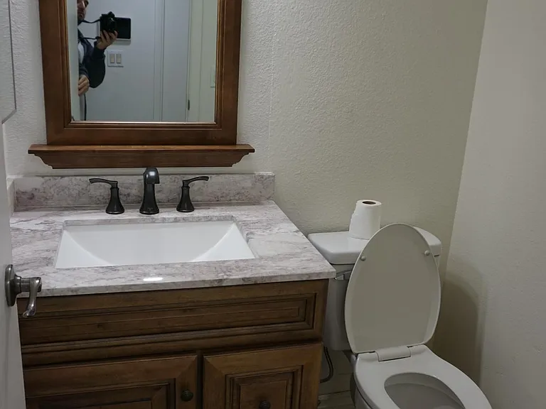 Half bathroom near entrance