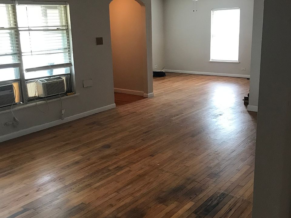 new paint, texture and refinished floors. 

dining room, entry way and living room