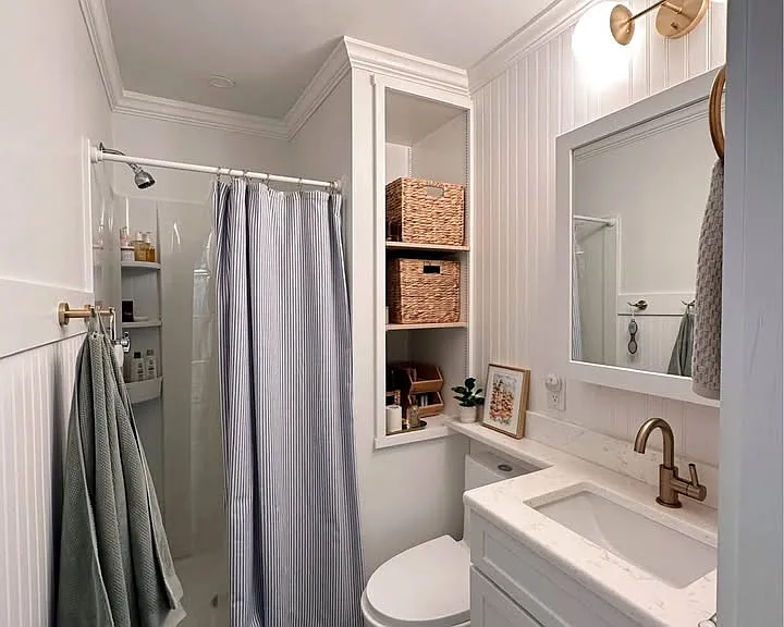 The bathroom was completely remodeled in 2022. There is a stall shower and storage.