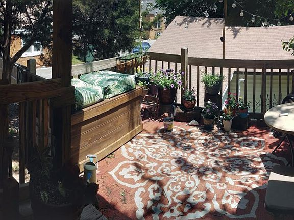 A past tenant really loved this patio and made it their own comfy space to relax.