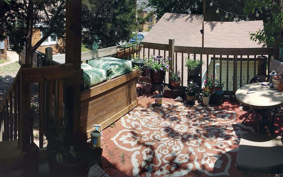 A past tenant really loved this patio and made it their own comfy space to relax.