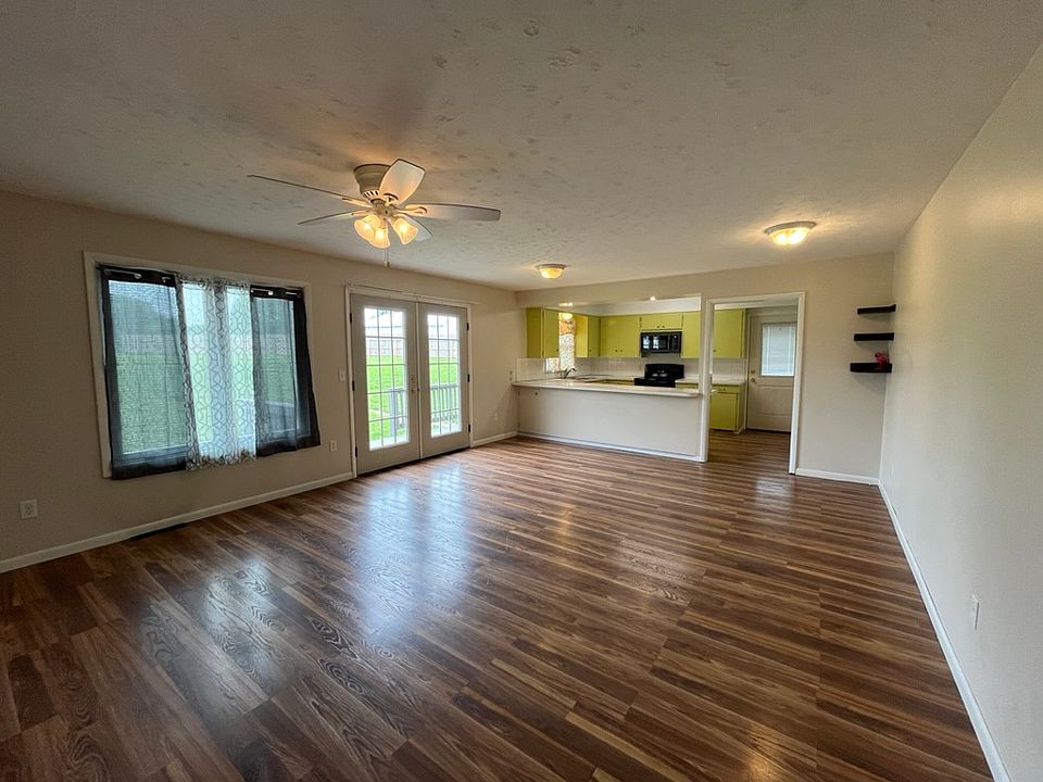 Living room looking into kitchen area