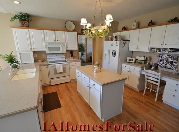 Kitchen - Designer Granite counter tops with built in sink. 