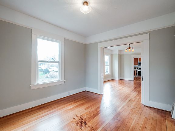 This is the front bedroom. There is a bigger closet in this room and sliding doors that open up into the living room.