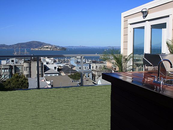 Roofdeck/outdoor kitchen with a panoramic view of the bay