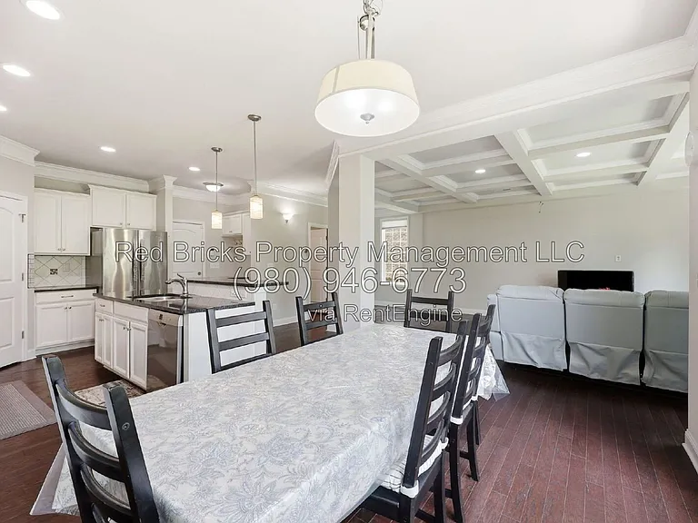 9659 Camberley Ave NW — Photo 20