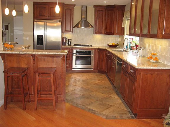 Sit at the bar and watch the cook