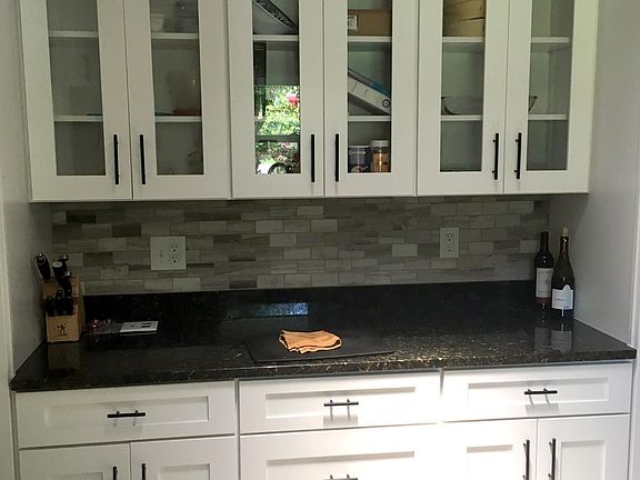 Kitchen bar area, facing west.