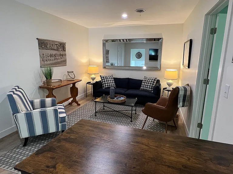 All new comfortable furnishings-sofa, two chairs, small table with 4 chairs, new 55" flat screen TV
