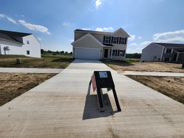 222 Vansen Dr, Kent City, MI 49330
