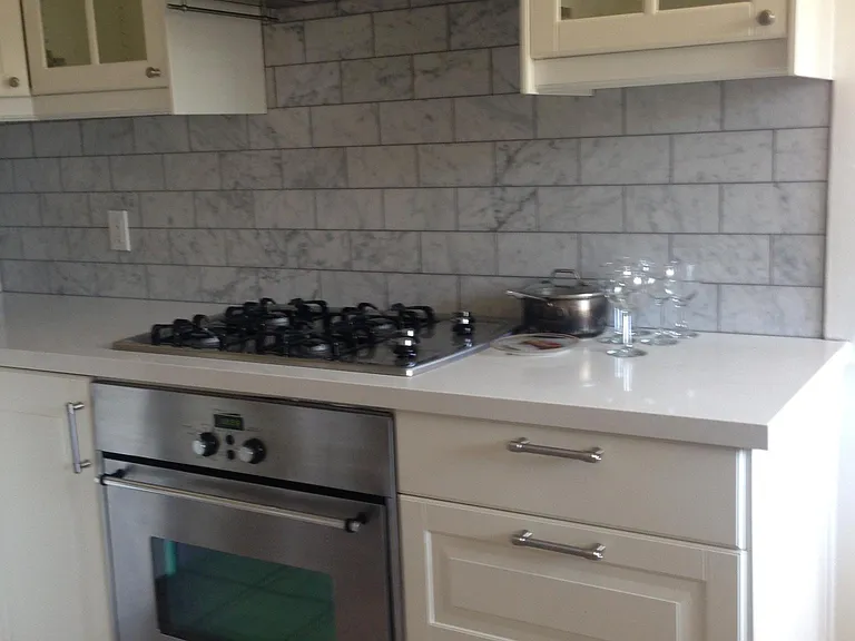 Kitchen is centrally located. Three entrances-through hallwa