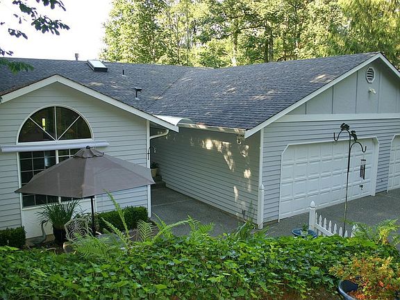 Front Exterior Patio & 3 Car garage