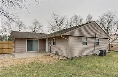 Patio with exit from Laundry Room and Den