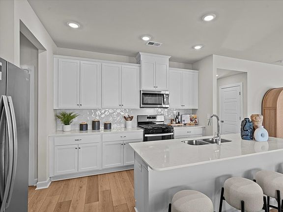Kitchen in the Brentwood floorplan at a Meritage Homes community in Greenville, SC.