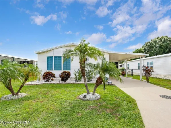 915 Hyacinth Cir, Barefoot Bay, FL 32976