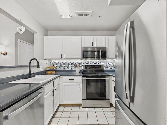 4th image of 14296 E Whitaker Pl W #111