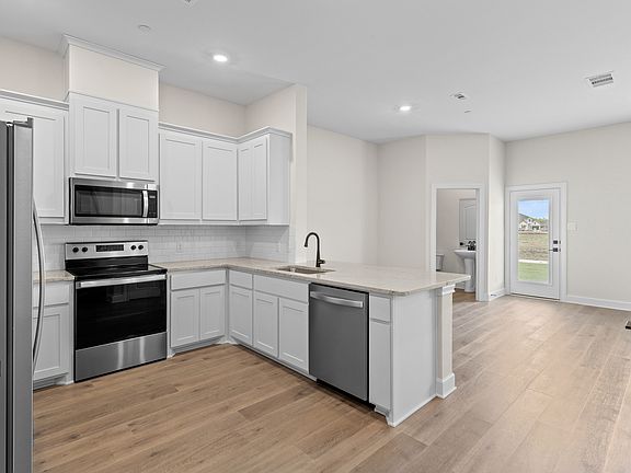 The kitchen of the Appaloosa sits right off of the dining area.