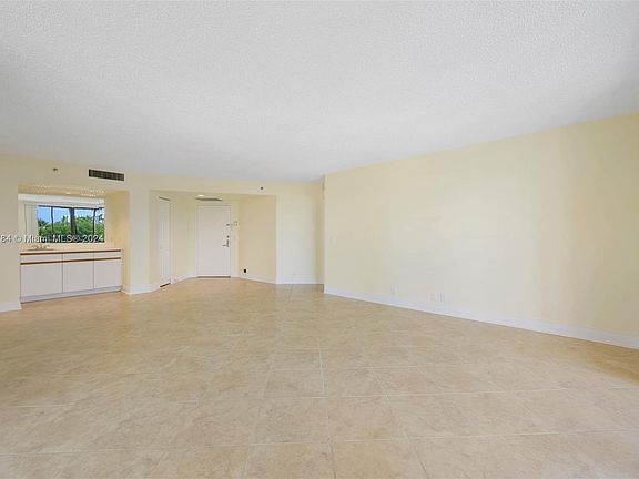 4th image of 3500 Mystic Pointe Dr APT 305