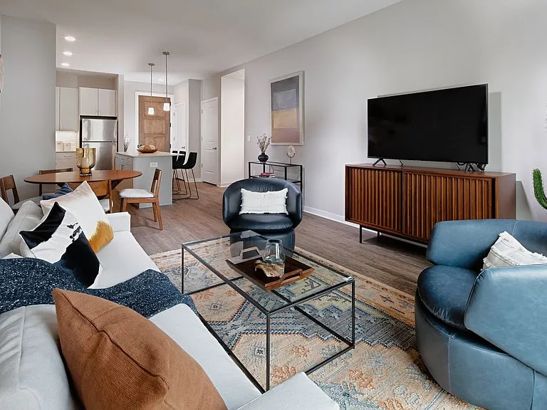 Base Scheme apartment home living and dining areas with hard surface flooring