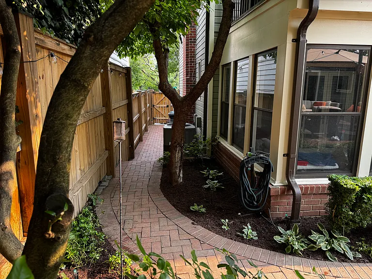 Side of house looking toward front gate.