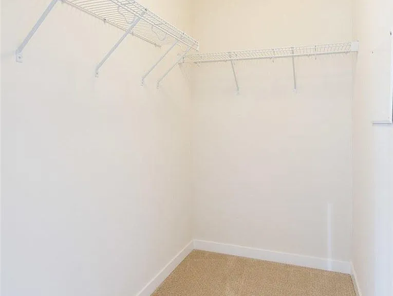 1 of 2 Master bedroom closets