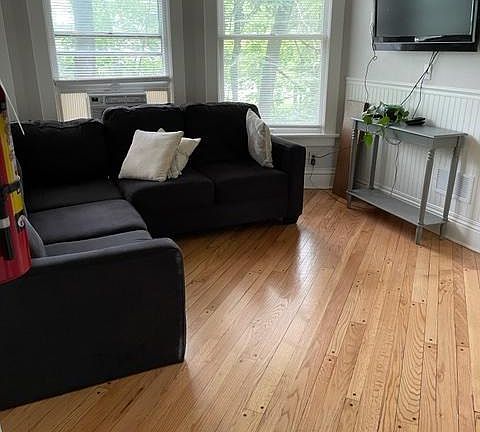 Living room with newly refinished wood floor