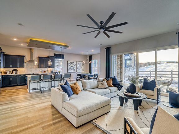 The Easton home design boats an open floor plan that seamlessly connects the main living areas of th