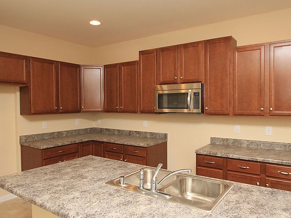 Kitchen with island and custom cabinets