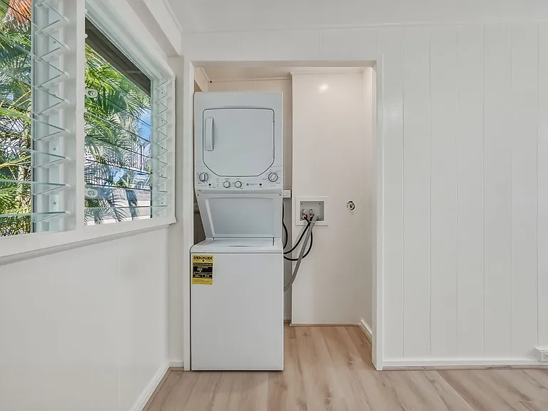 There is a stackable new washer/dryer in the living area closet.