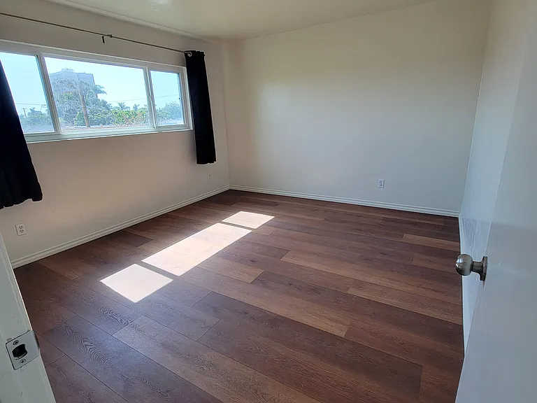 Bedroom 13' x 15.5' New LVP flooring, huge closet