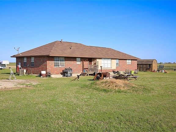 This is the largest of the four homes.  It is approx 2200 sq. ft. and has 4 bedrooms and 2 baths.  The street address for it is 9630 Swafford Road.