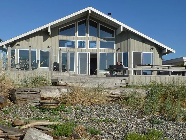 Relax on the deck or enjoy a fire in the firepit by the beach.