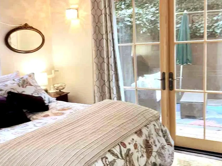 French door to patio, Wall sconces.