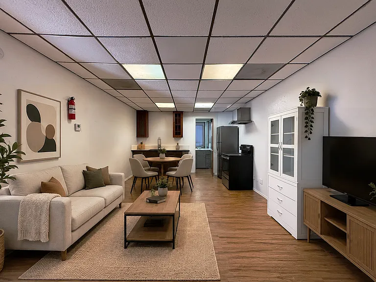 Virtually Staged. Kitchen, dining, and living area. Refrigerator will be included.