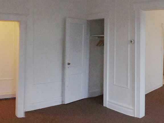 Panoramic view of sun room, entrance,living room and dining room
