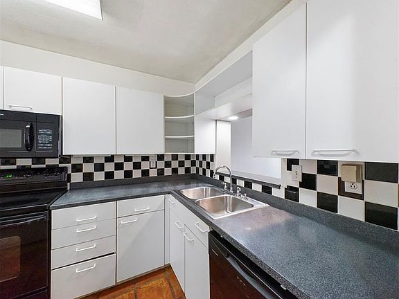 Dishwasher and refrigerator are included.